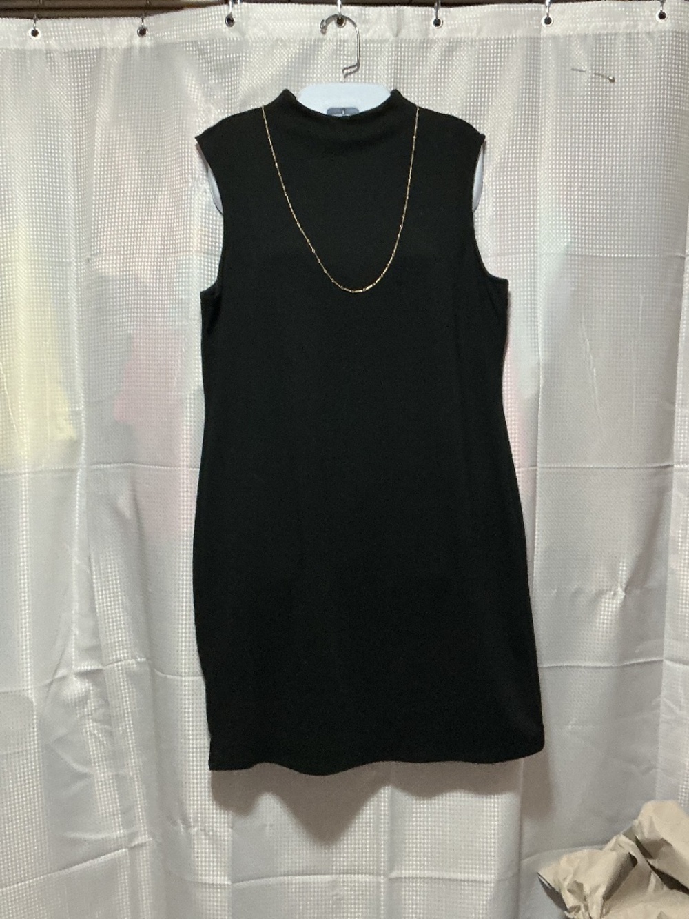 Black sleeveless sheath. NWT